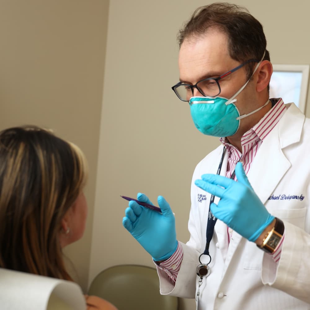 Dr. Dobyansky with a patient