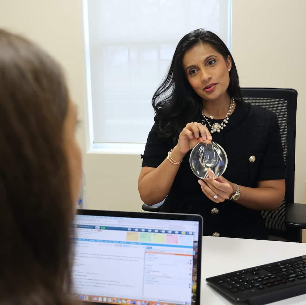 Dr. Veera with a breast aug patient