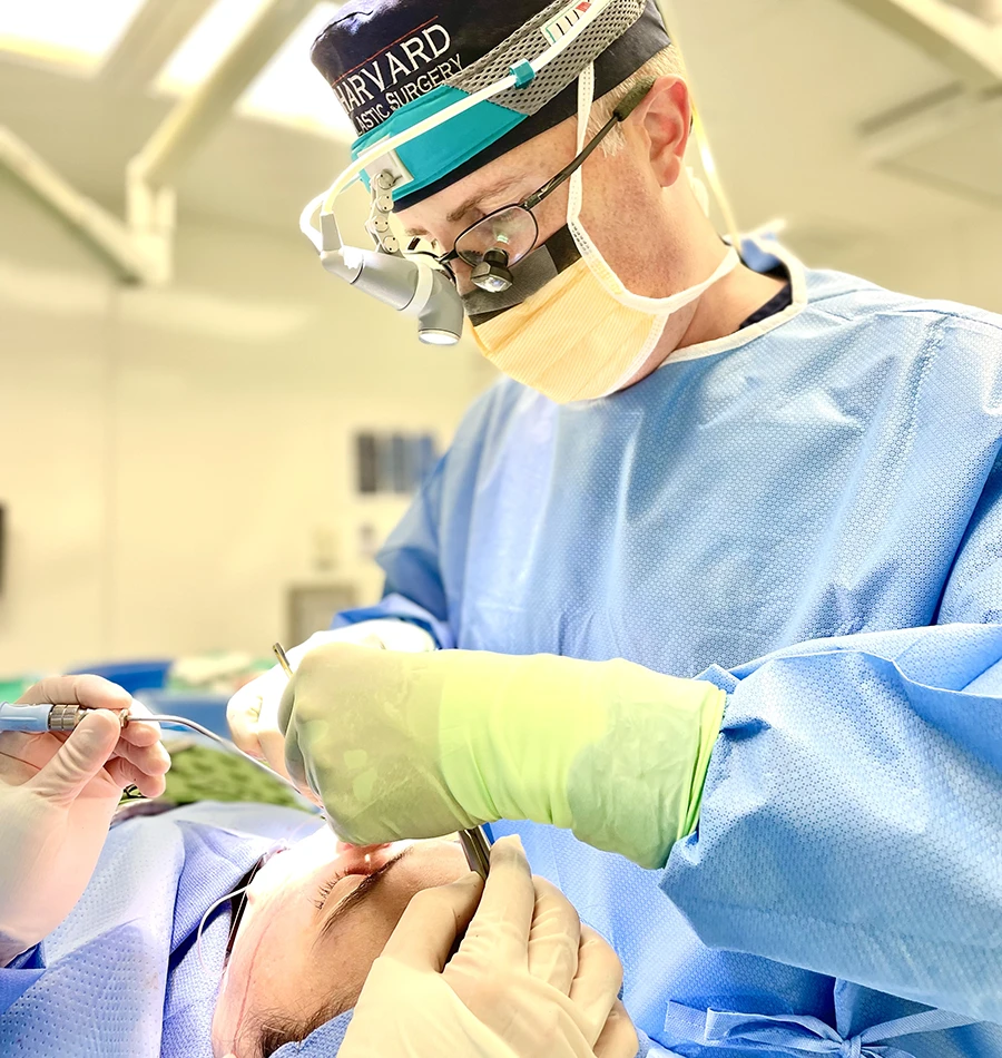 doctor performing rhinoplasty surgery